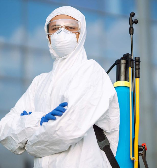 disinfecting-to-prevent-covid-19-man-in-protectiv-2025-03-05-05-32-49-AYUVLQG.jpg
